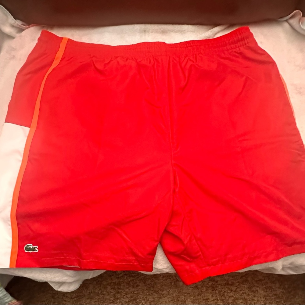 Summer is here!!Lacoste men’s swim trucks size 7 XXL NWT